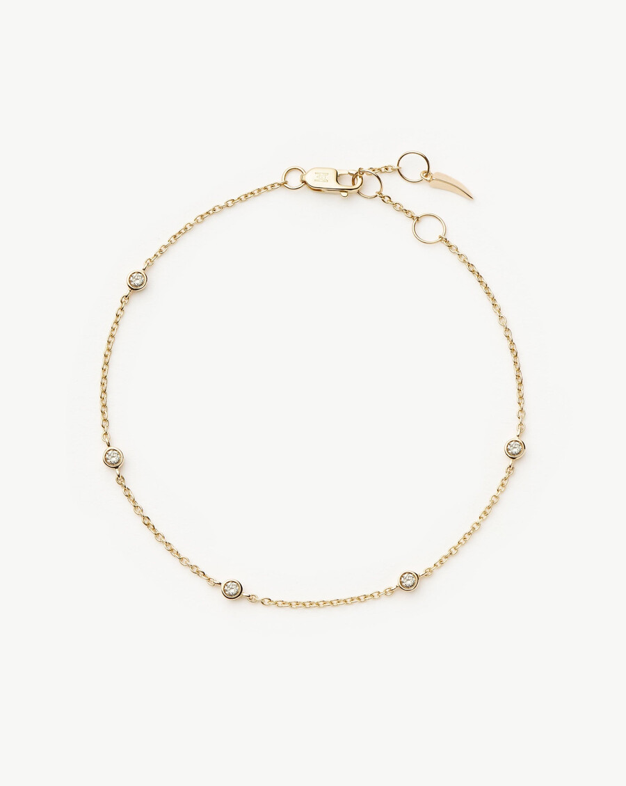 bracelet en or massif 14 carats avec diamants flottants