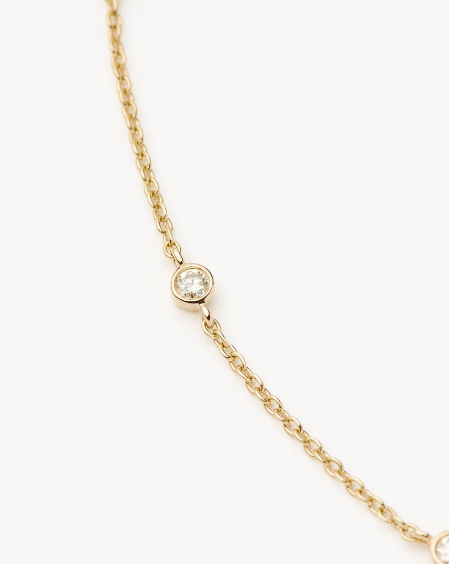 bracelet en or massif 14 carats avec diamants flottants