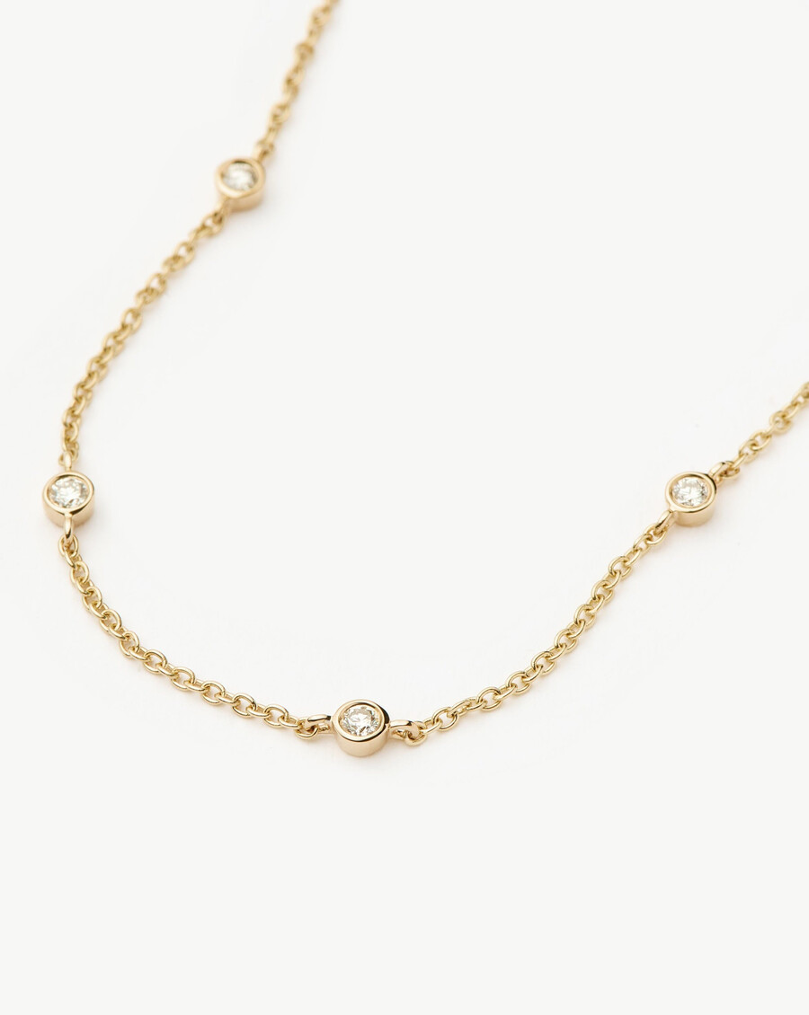 bracelet en or massif 14 carats avec diamants flottants