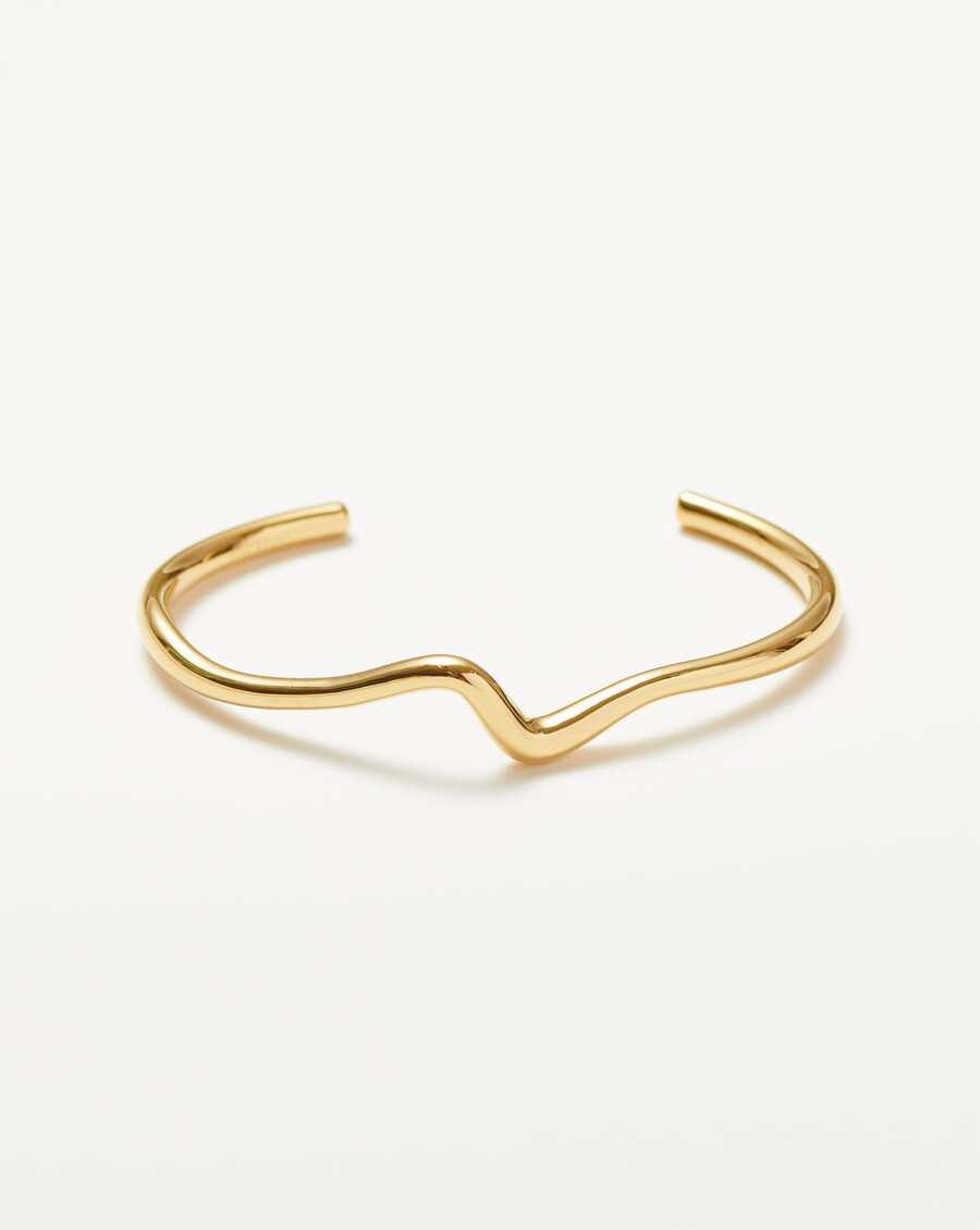 bracelet manchette en or à effet vague fondue
