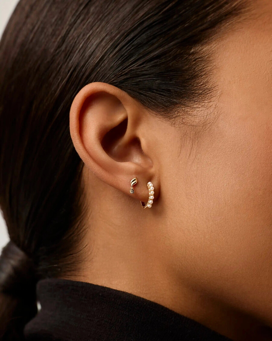 boucle doreille savi en or massif 14 carats avec un seul diamant
