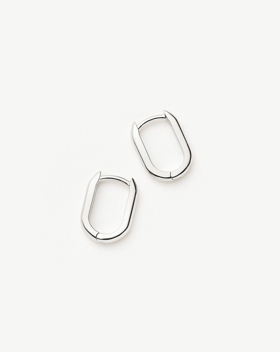 boucles doreilles créoles ovales miniatures en or blanc massif 14 carats