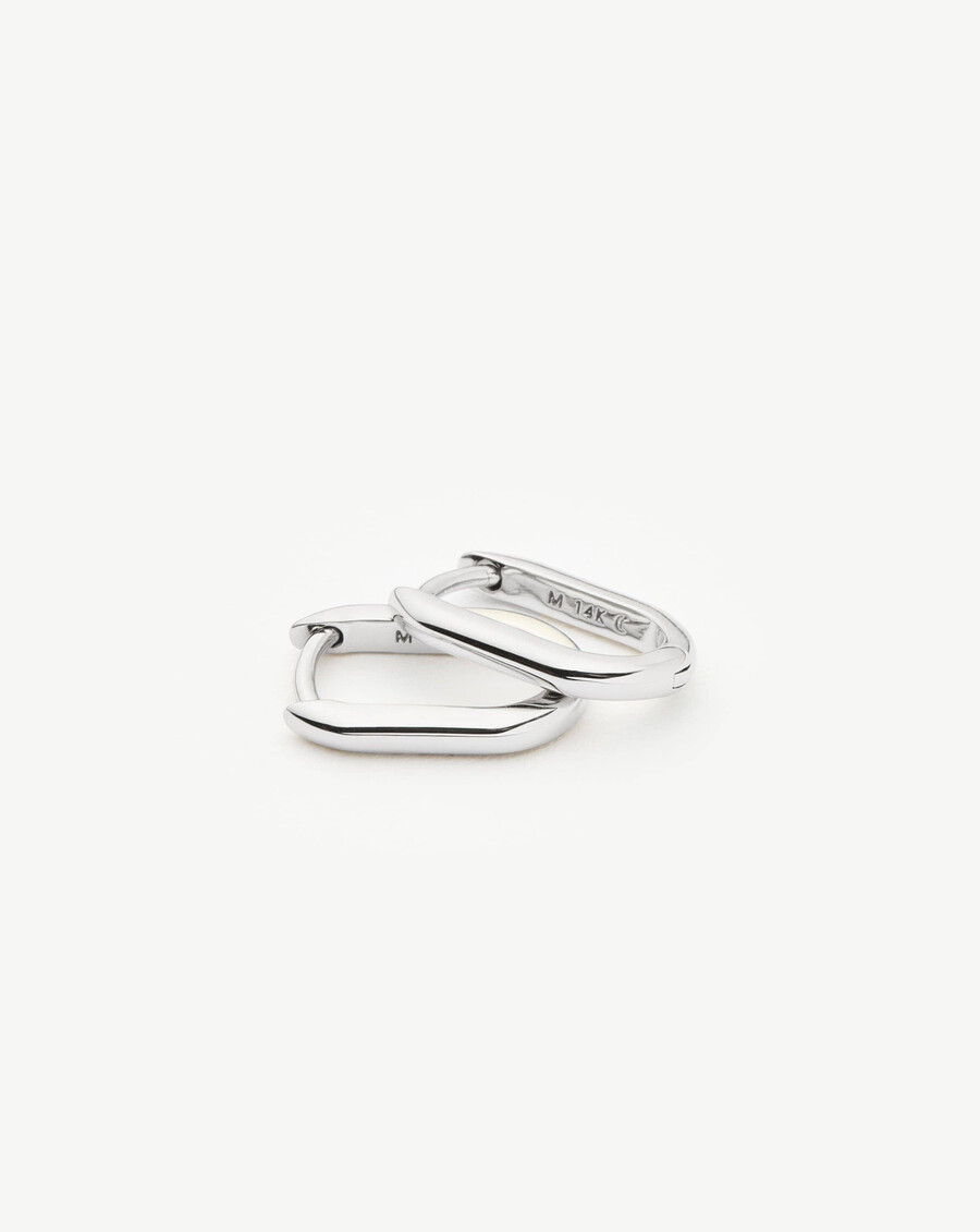 boucles doreilles créoles ovales miniatures en or blanc massif 14 carats