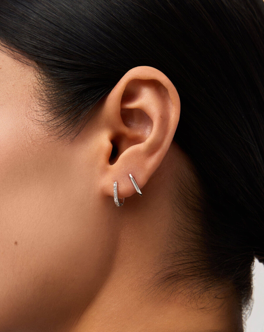 boucles doreilles créoles ovales miniatures en or blanc massif 14 carats