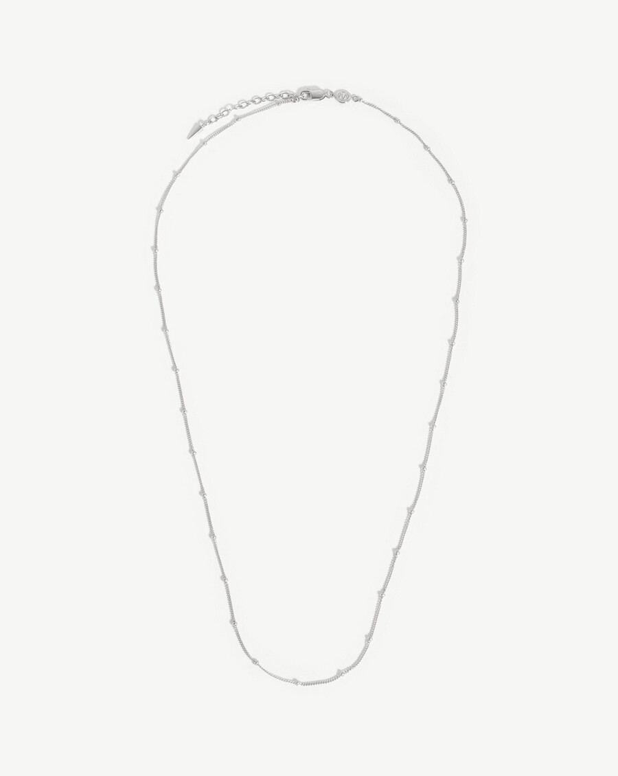 collier à long pompon